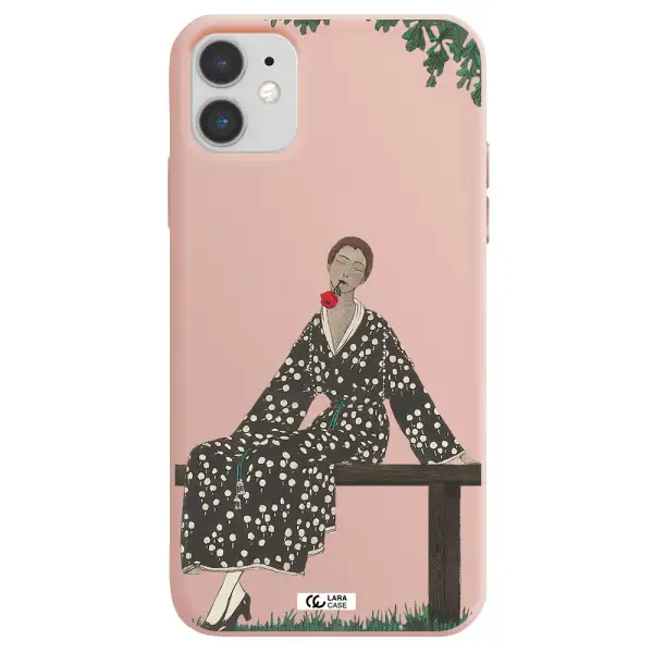 a woman sitting on a bench Apple iPhone 11 Silicone pastel pink Case