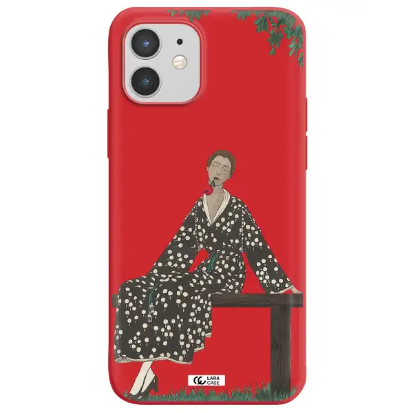 a woman sitting on a bench Apple iPhone 12 Silicone Imperial Red Case