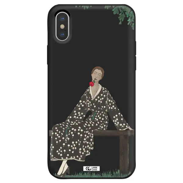 a woman sitting on a bench Apple iPhone X Silicone black Case