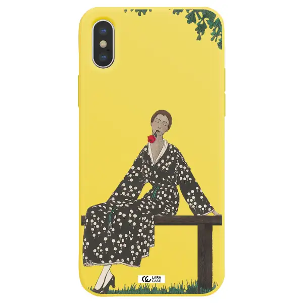 a woman sitting on a bench Apple iPhone XS Silicone canary yellow Case