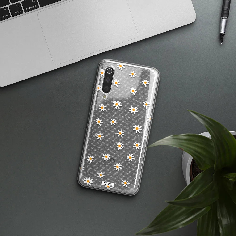 a white background with orange dots Xiaomi Mi 9 Clear TPU Case