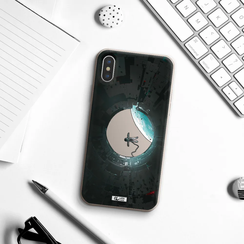 a astronaut in a space station Apple iPhone XS Silicone Stone Case