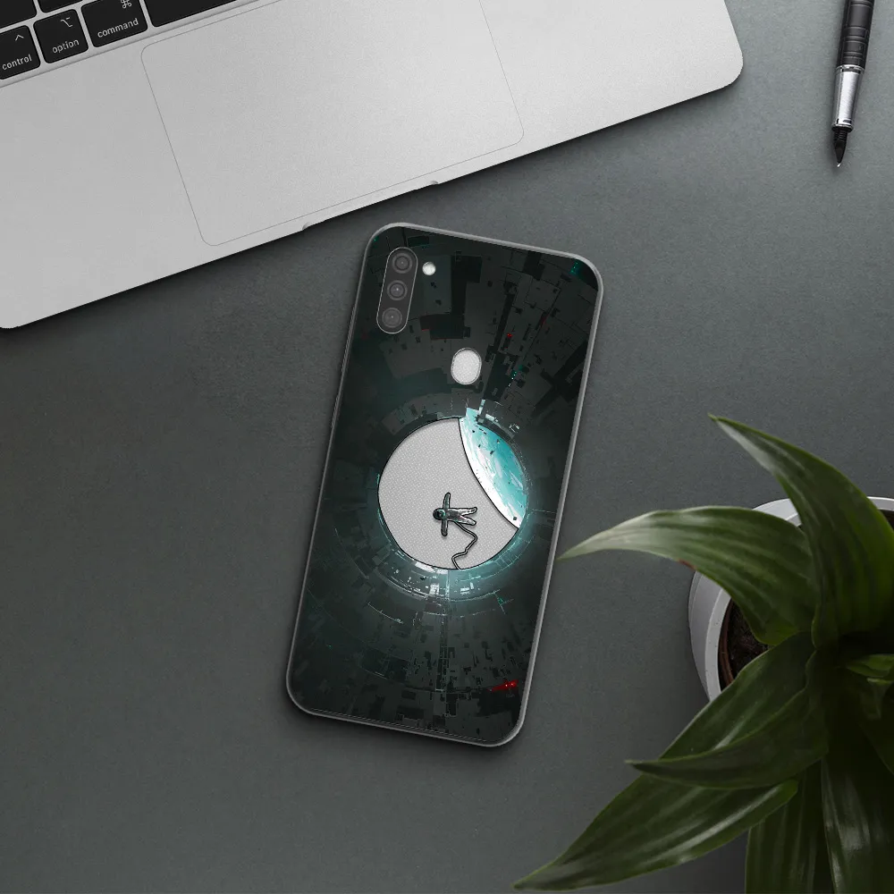 a astronaut in a space station Samsung M11 Clear TPU Case