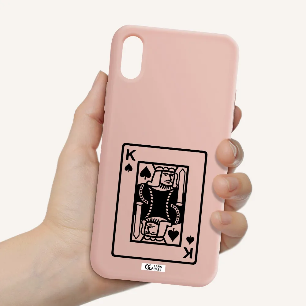 a black and white card with a man in a crown Apple iPhone XS Silicone pastel pink Case