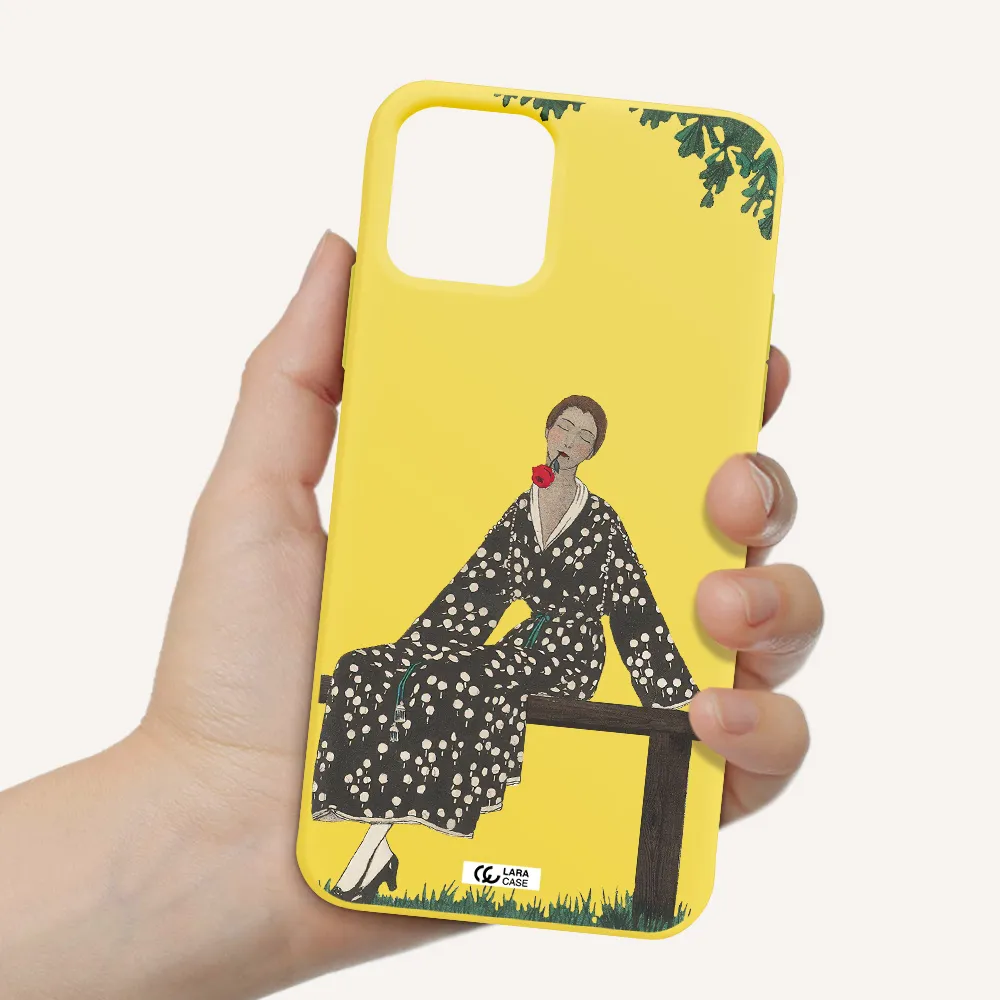a woman sitting on a bench Apple iPhone 11 pro max Silicone canary yellow Case