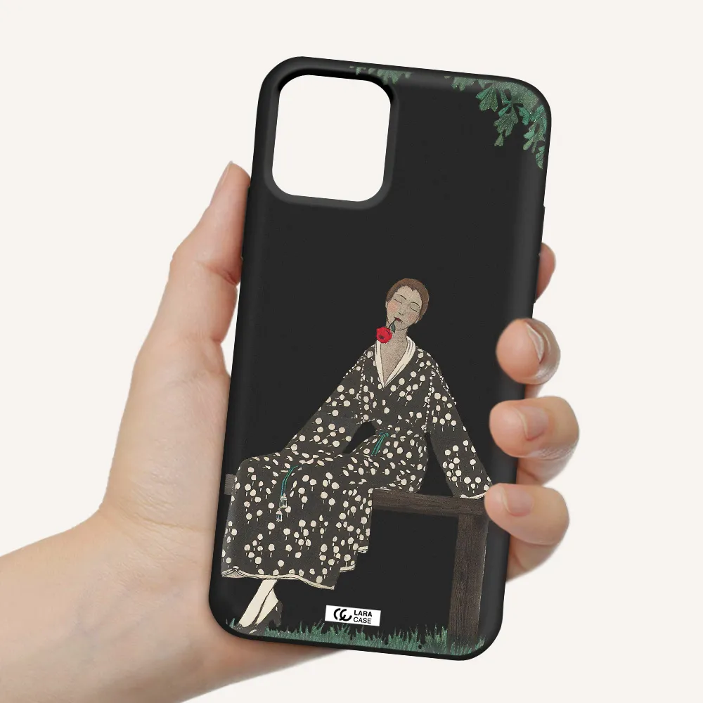 a woman sitting on a bench Apple iPhone 11 pro Silicone black Case