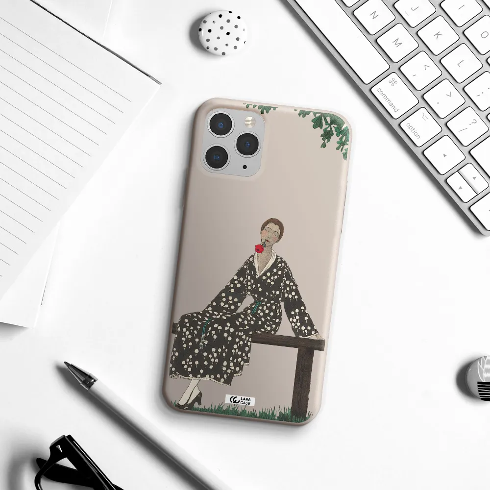 a woman sitting on a bench Apple iPhone 11 pro Silicone Stone Case