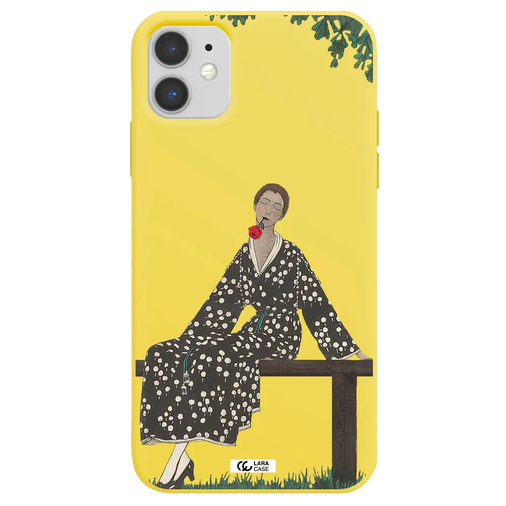 a woman sitting on a bench Apple iPhone 11 Silicone canary yellow Case