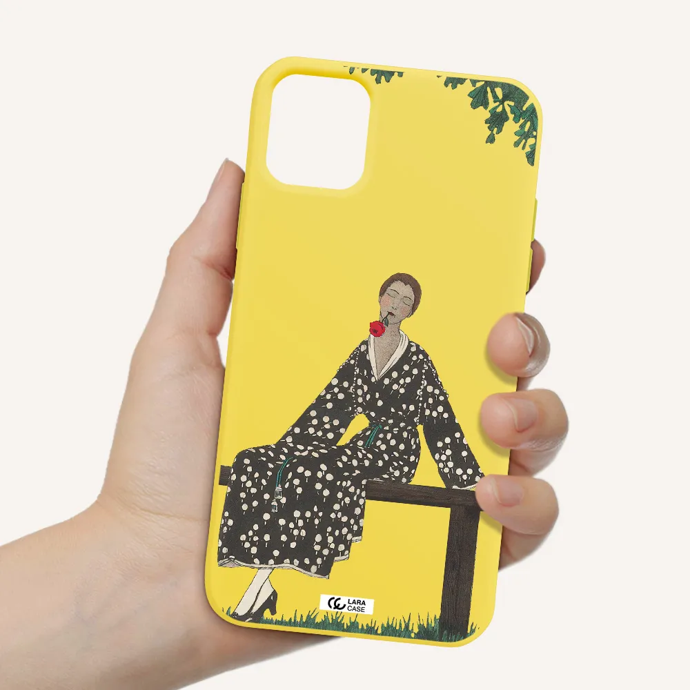 a woman sitting on a bench Apple iPhone 11 Silicone canary yellow Case