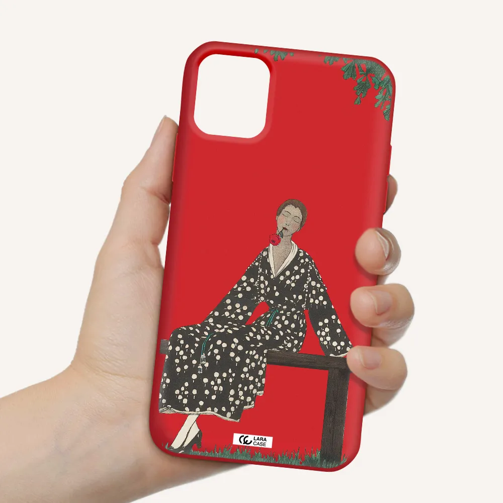 a woman sitting on a bench Apple iPhone 11 Silicone Imperial Red Case