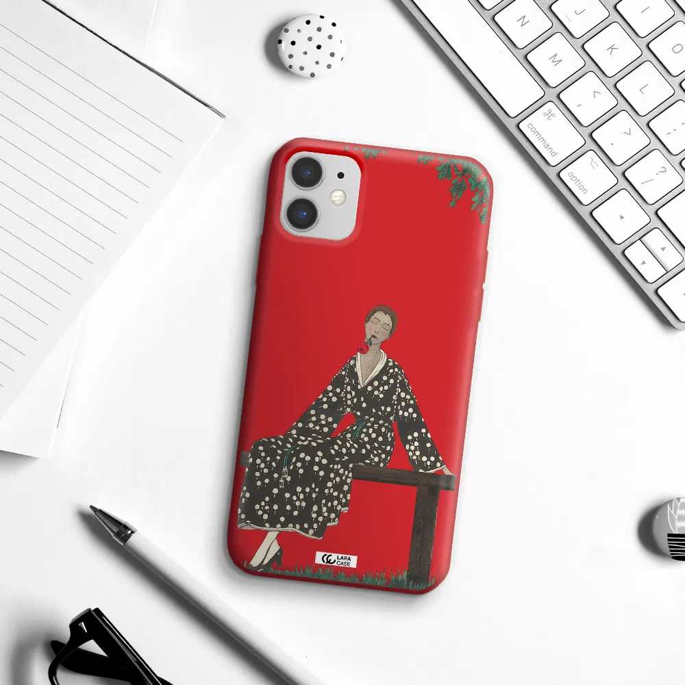 a woman sitting on a bench Apple iPhone 11 Silicone Imperial Red Case