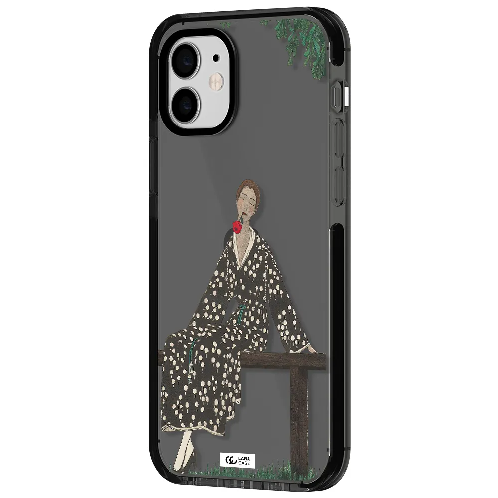 a woman sitting on a bench Apple iPhone 12 impact Smoke Black Case