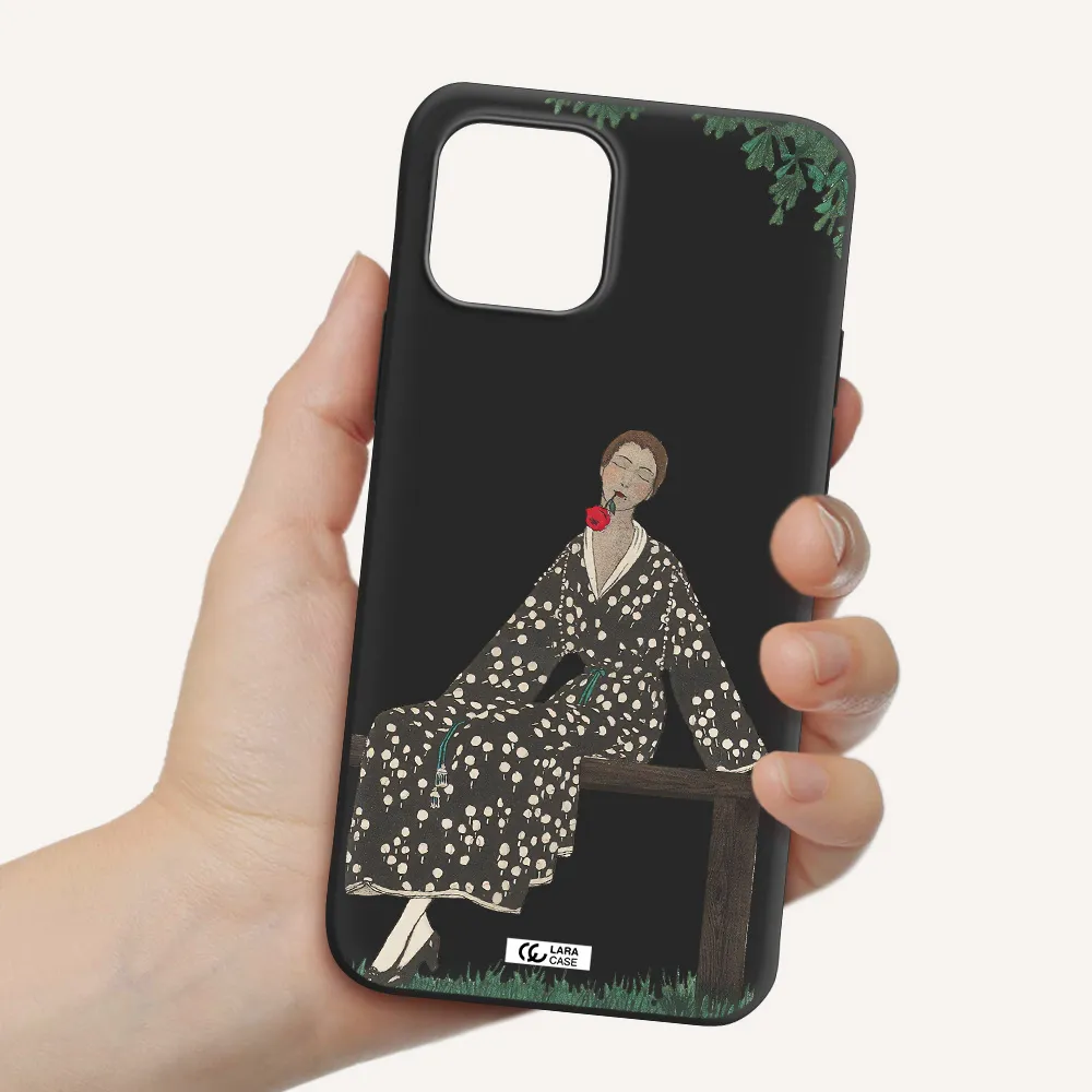 a woman sitting on a bench Apple iPhone 12 mini Silicone black Case