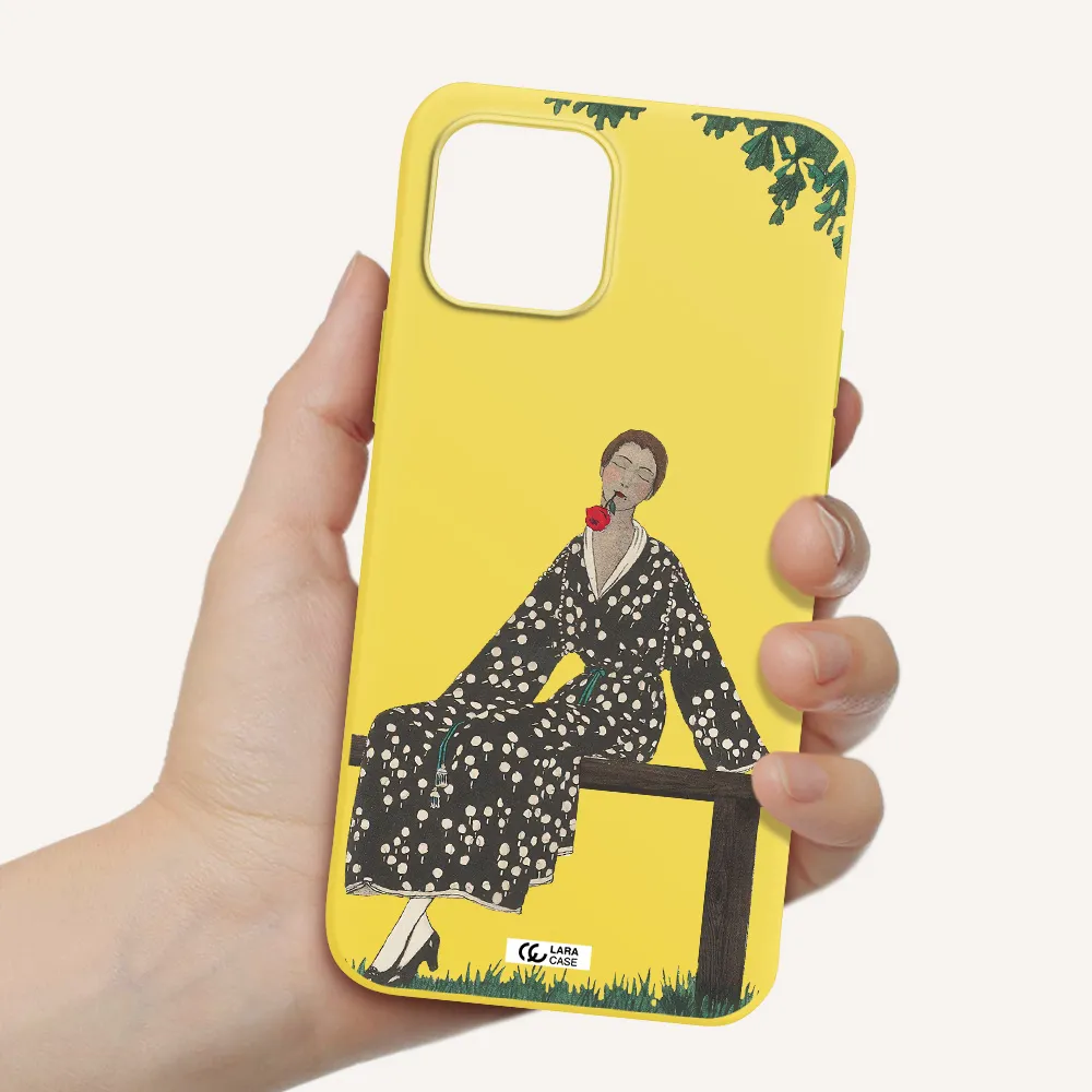 a woman sitting on a bench Apple iPhone 12 mini Silicone canary yellow Case