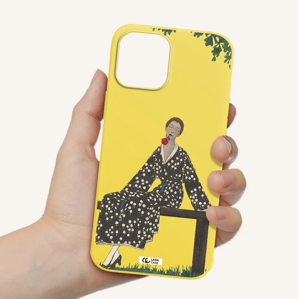a woman sitting on a bench Apple iPhone 12 pro max Silicone canary yellow Case