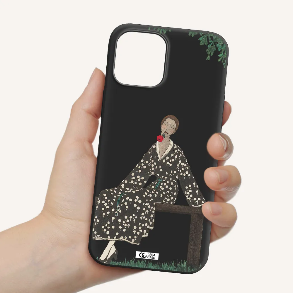 a woman sitting on a bench Apple iPhone 12 pro Silicone black Case