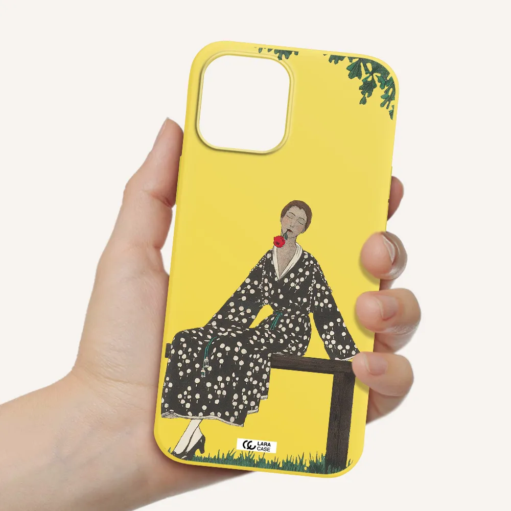 a woman sitting on a bench Apple iPhone 12 pro Silicone canary yellow Case