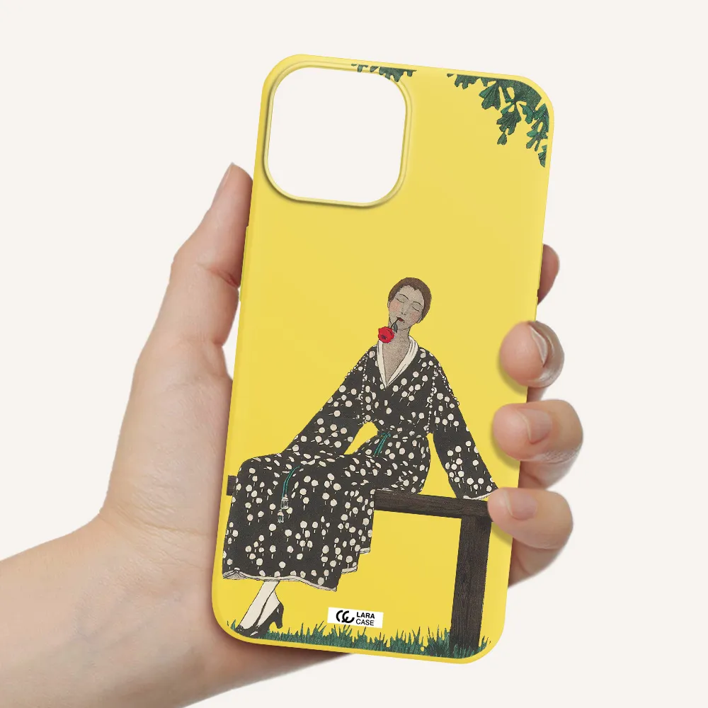 a woman sitting on a bench Apple iPhone 13 mini Silicone canary yellow Case