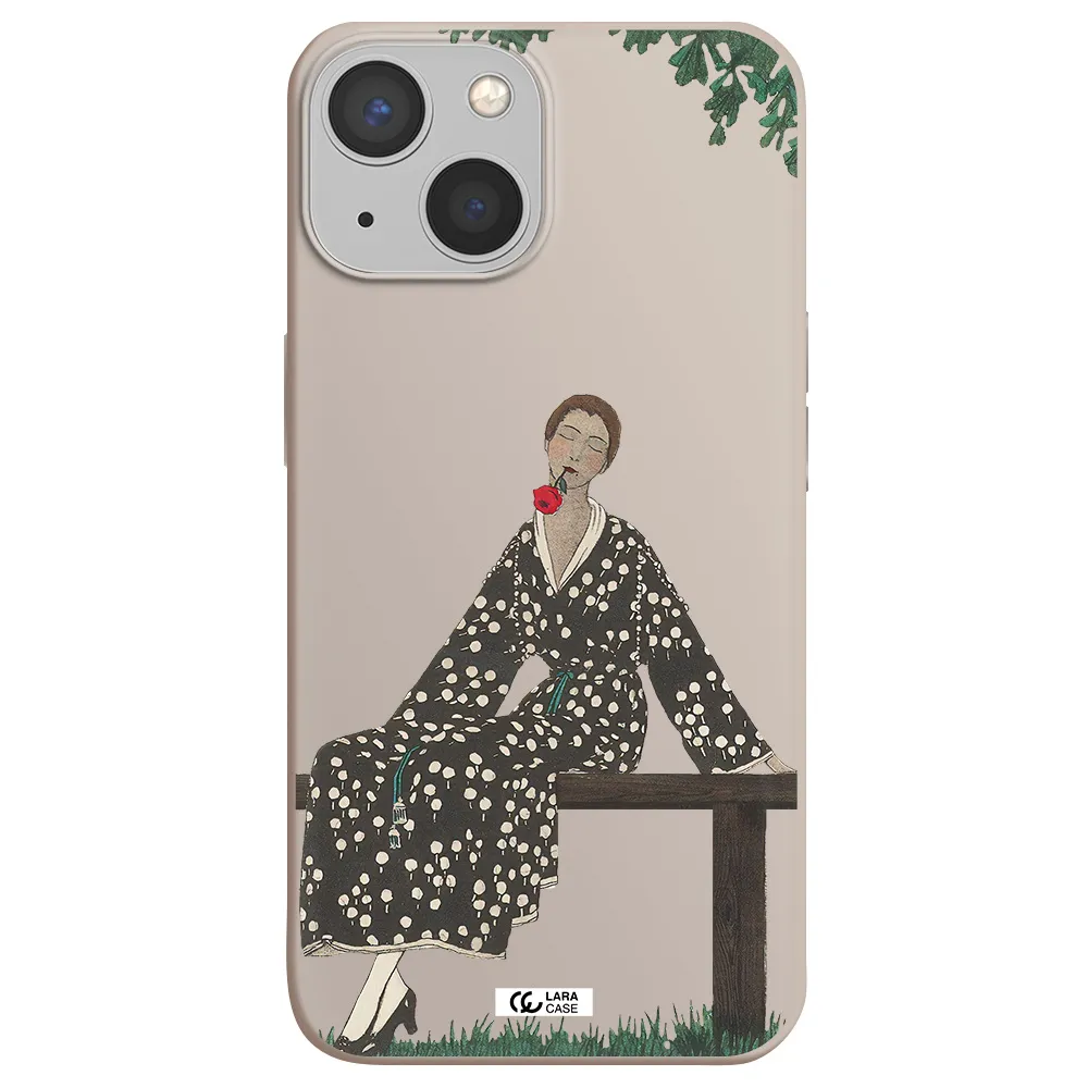 a woman sitting on a bench Apple iPhone 13 mini Silicone Stone Case