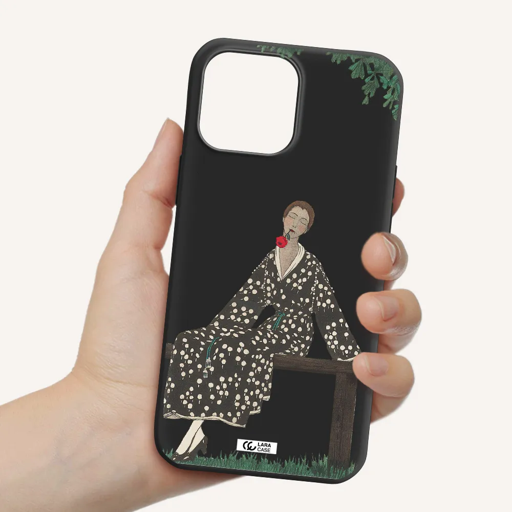 a woman sitting on a bench Apple iPhone 13 Pro Max Silicone black Case