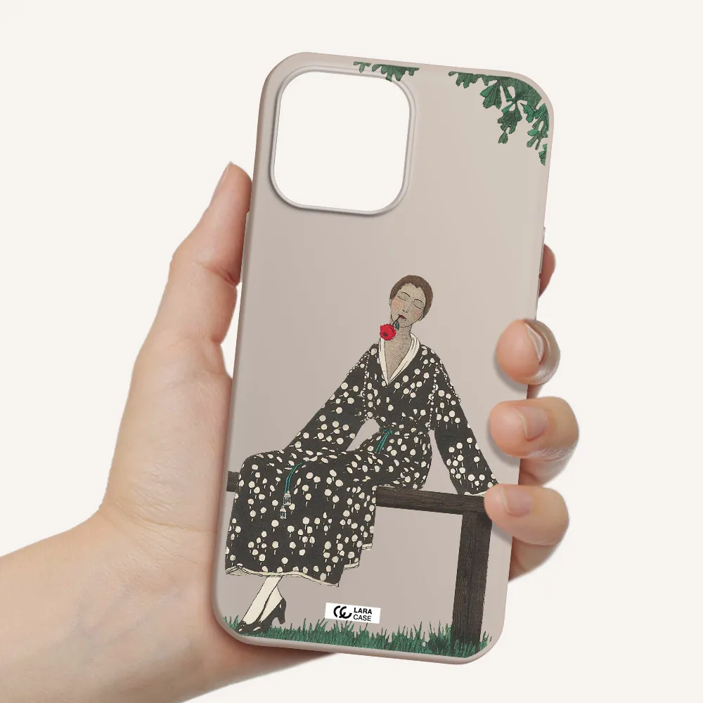 a woman sitting on a bench Apple iPhone 13 Pro Silicone Stone Case