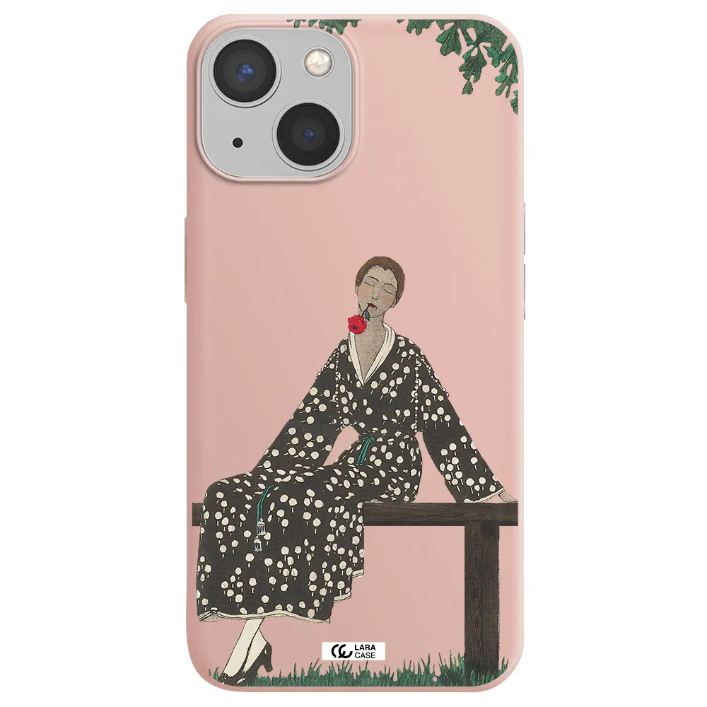 a woman sitting on a bench Apple iPhone 13 Silicone pastel pink Case