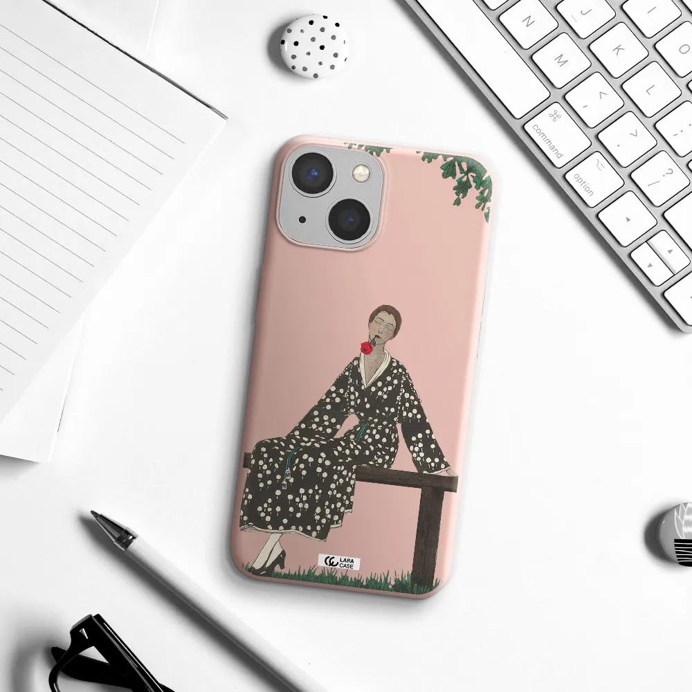 a woman sitting on a bench Apple iPhone 13 Silicone pastel pink Case