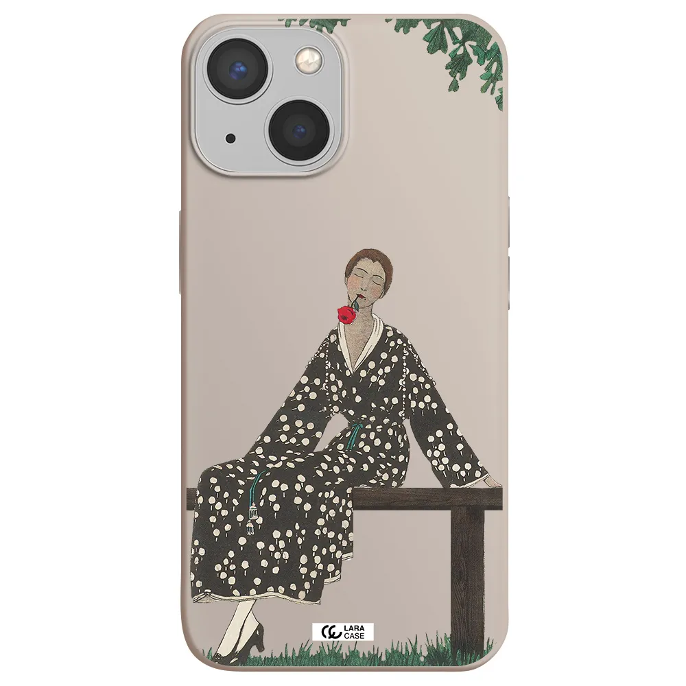 a woman sitting on a bench Apple iPhone 13 Silicone Stone Case