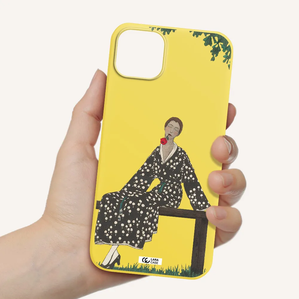 a woman sitting on a bench Apple iPhone 14 plus Silicone canary yellow Case