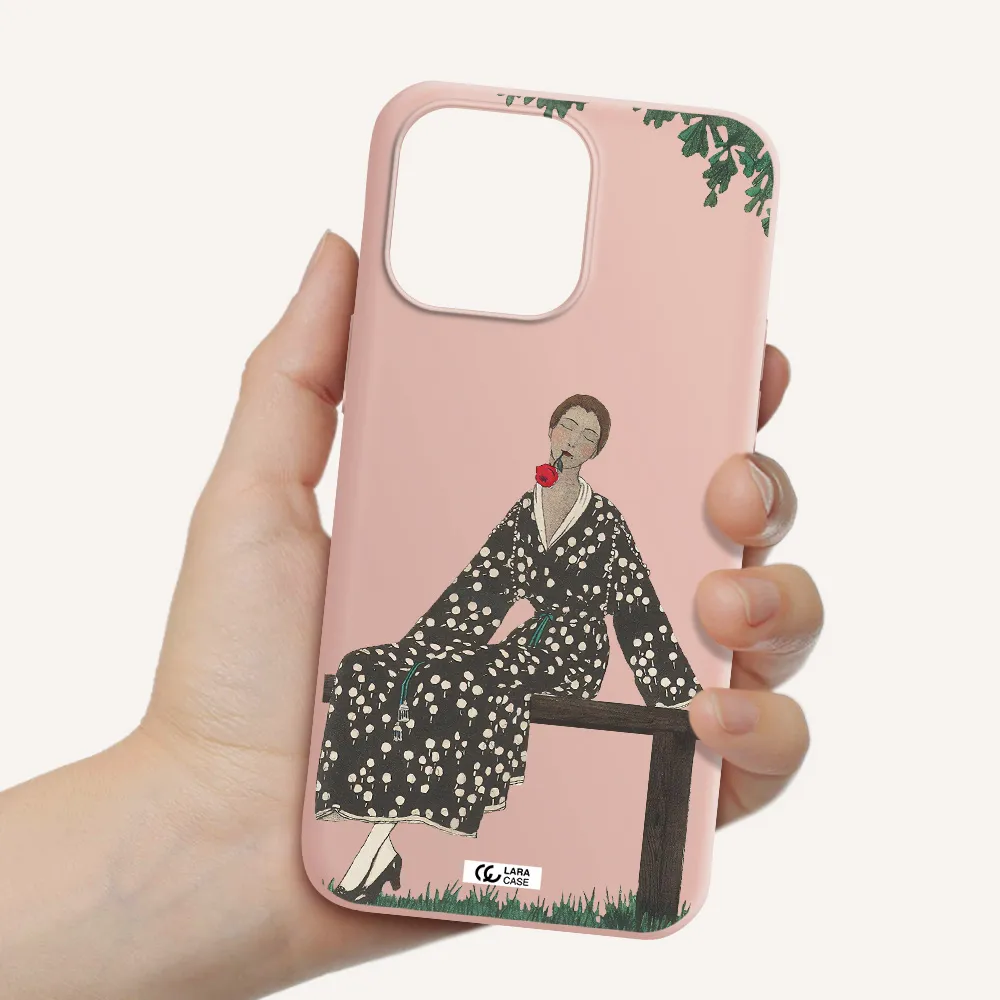 a woman sitting on a bench Apple iPhone 14 pro max Silicone pastel pink Case