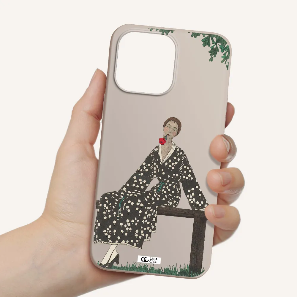 a woman sitting on a bench Apple iPhone 14 pro max Silicone Stone Case