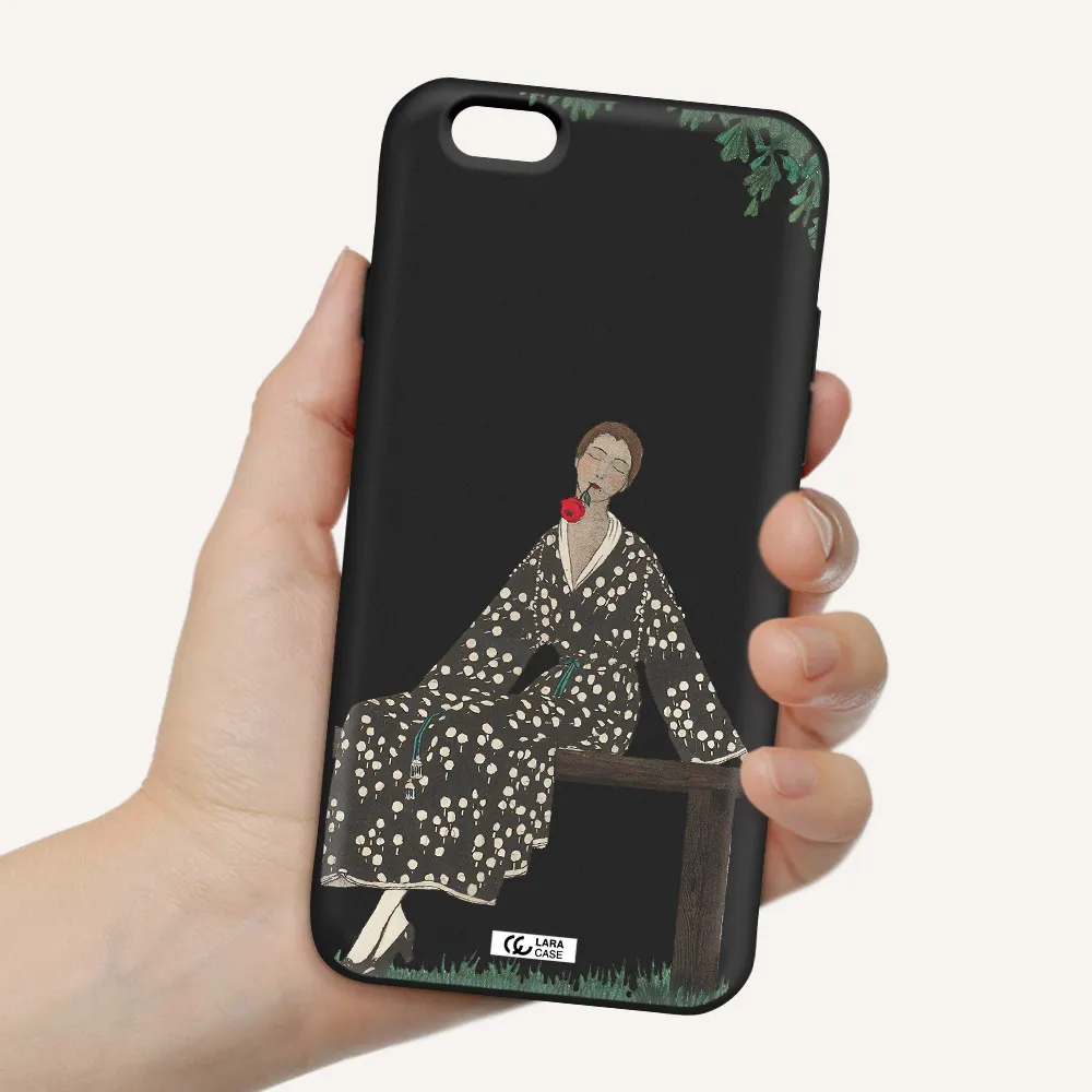 a woman sitting on a bench Apple iPhone 6 Silicone black Case