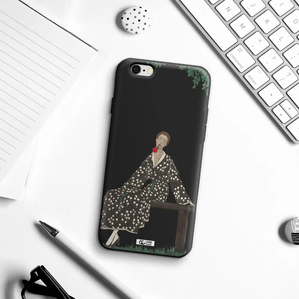 a woman sitting on a bench Apple iPhone 6 Silicone black Case