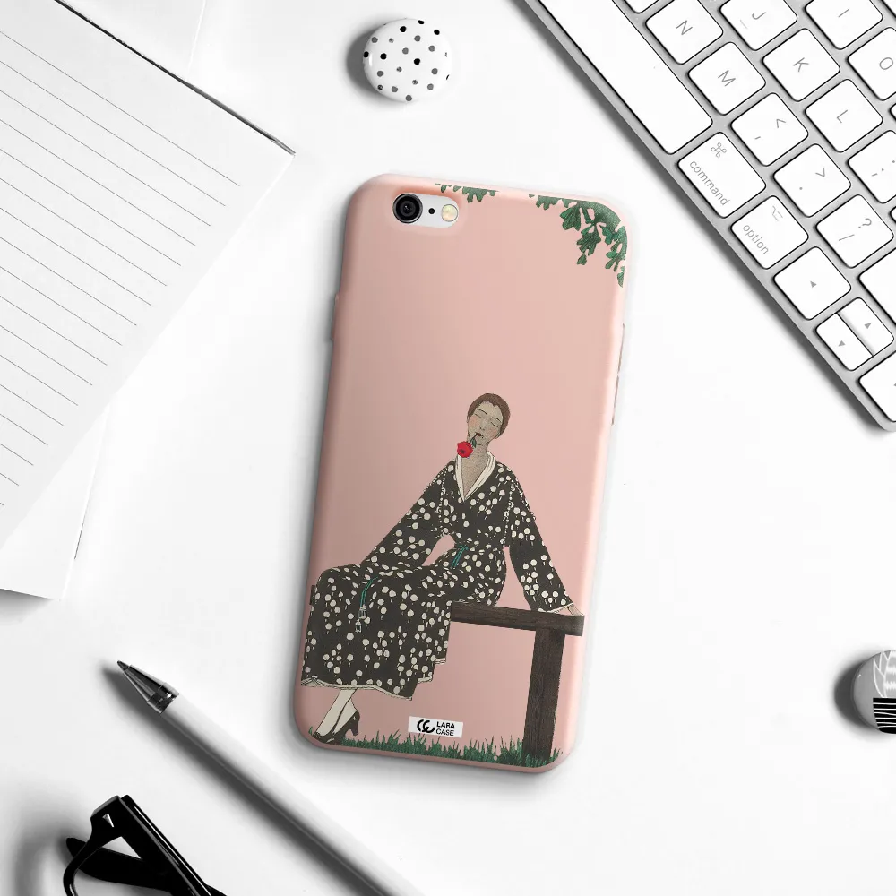 a woman sitting on a bench Apple iPhone 6 Silicone pastel pink Case