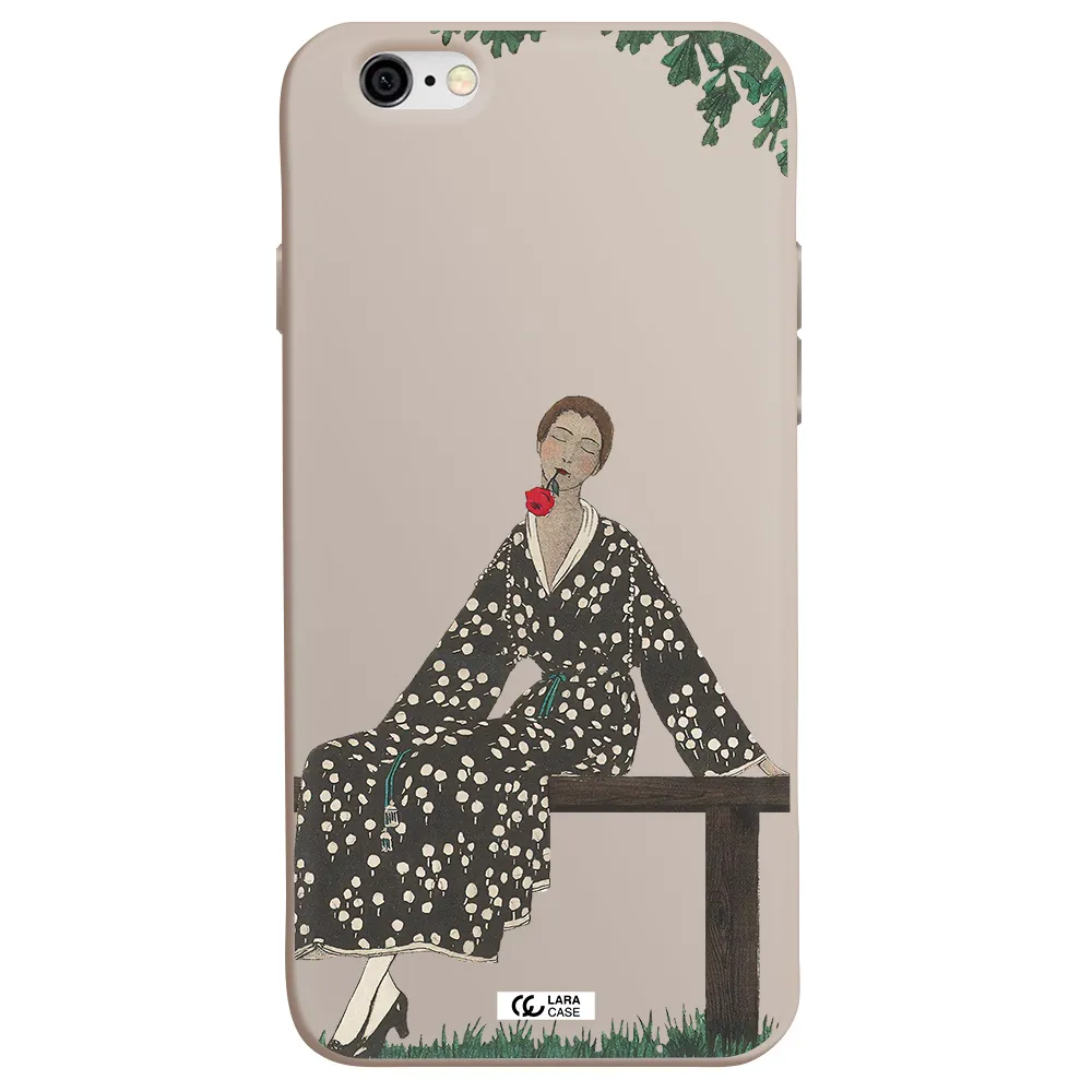 a woman sitting on a bench Apple iPhone 6 Silicone Stone Case