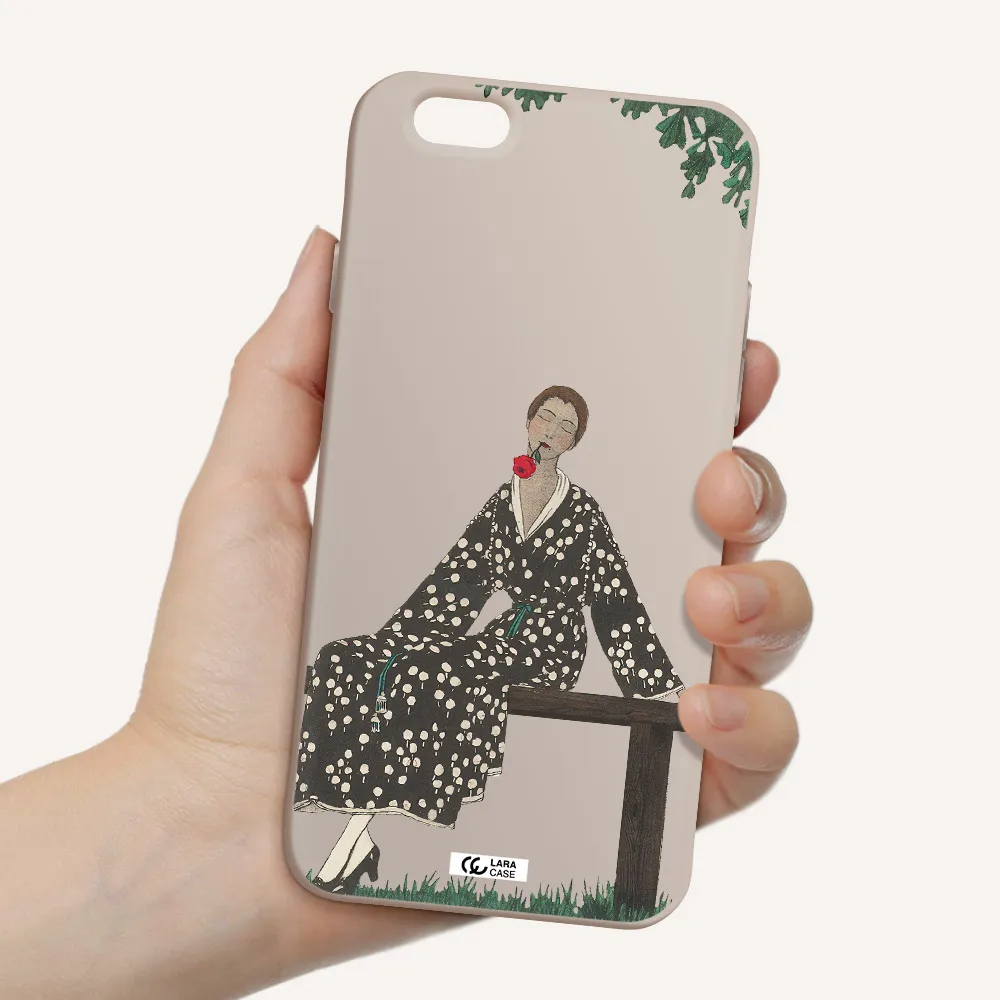 a woman sitting on a bench Apple iPhone 6 Silicone Stone Case