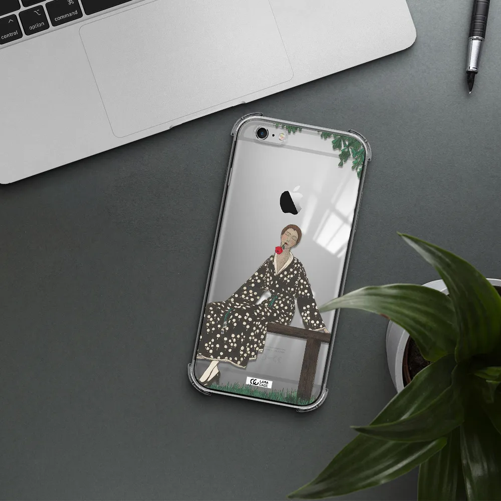 a woman sitting on a bench Apple iPhone 6S Clear PC Case