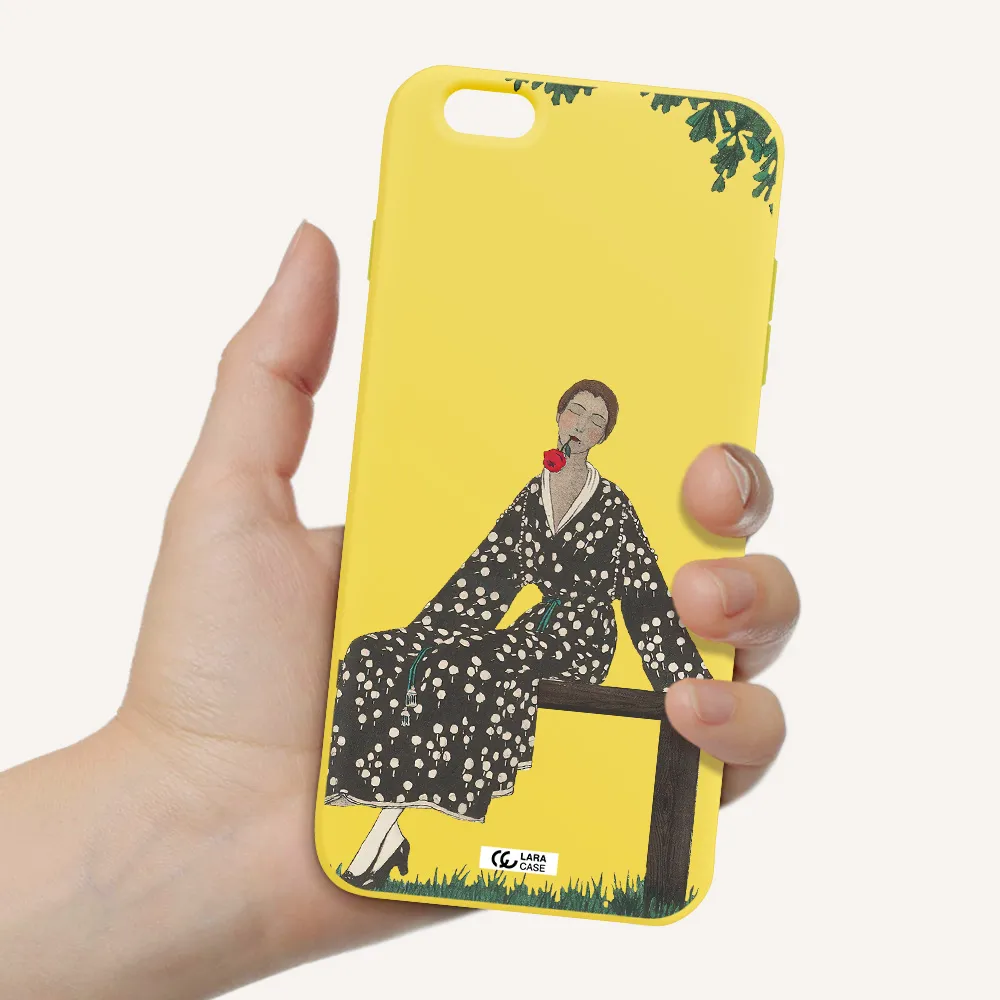 a woman sitting on a bench Apple iPhone 6S Silicone canary yellow Case