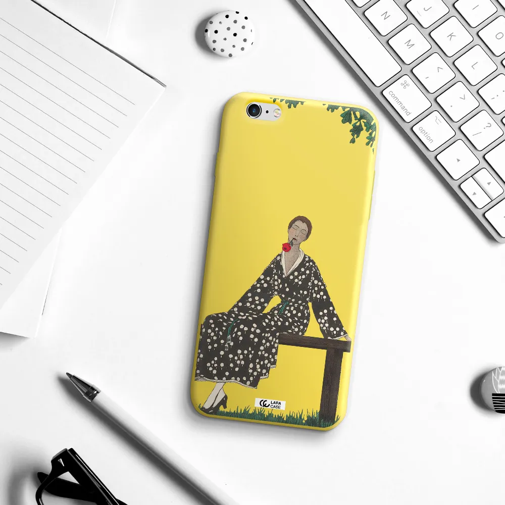a woman sitting on a bench Apple iPhone 6S Silicone canary yellow Case