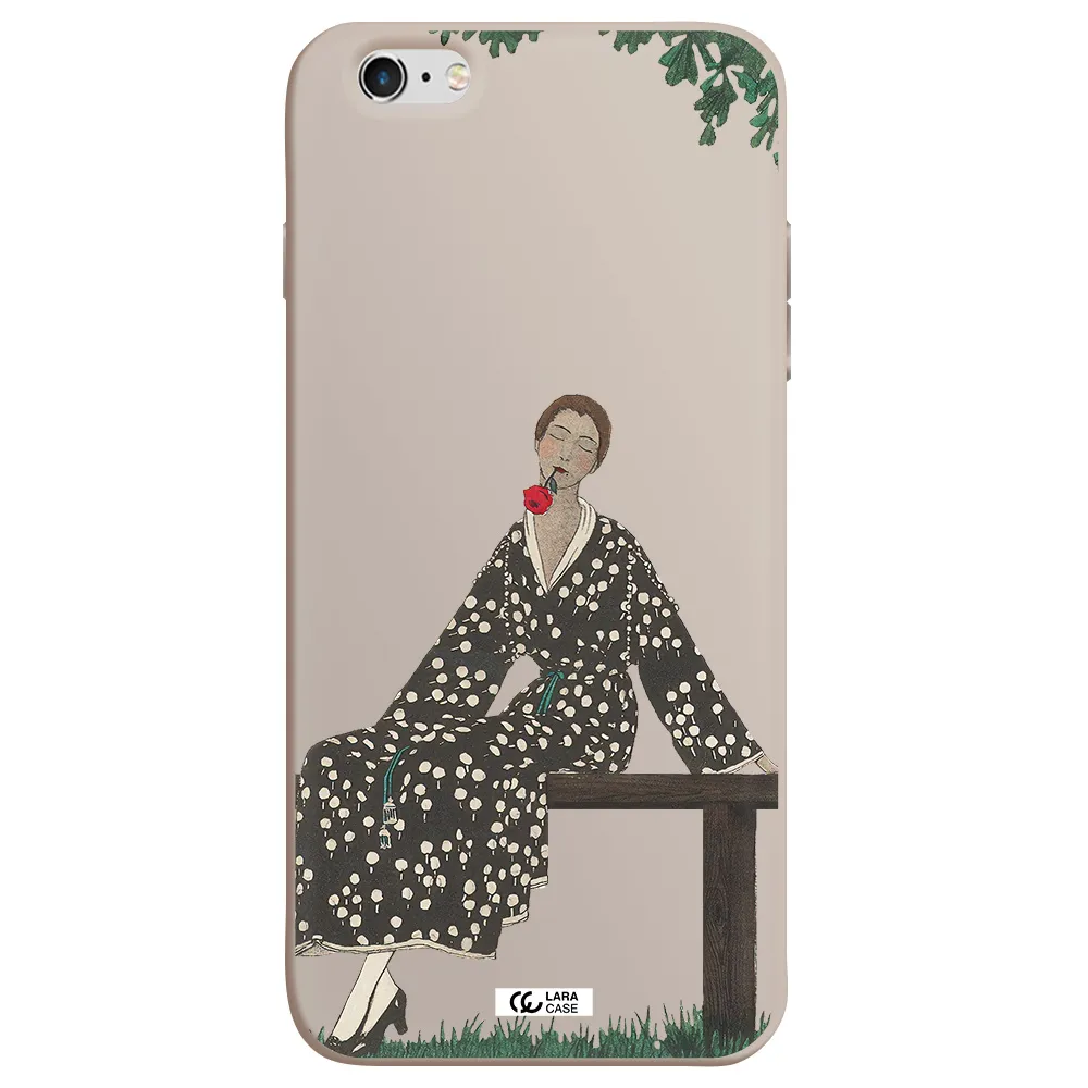 a woman sitting on a bench Apple iPhone 6S Silicone Stone Case