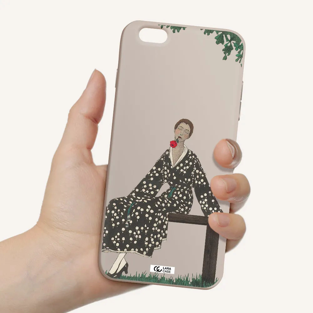 a woman sitting on a bench Apple iPhone 6S Silicone Stone Case