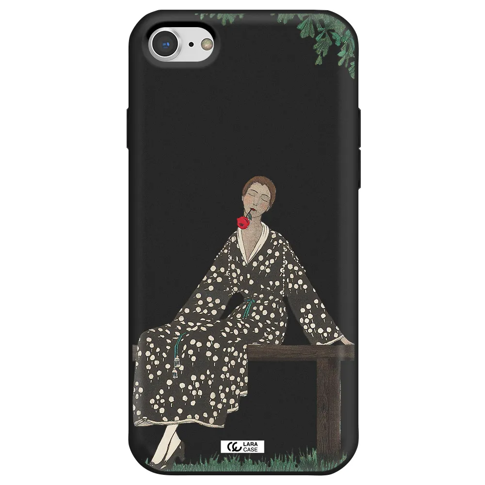 a woman sitting on a bench Apple iPhone 7 Silicone black Case