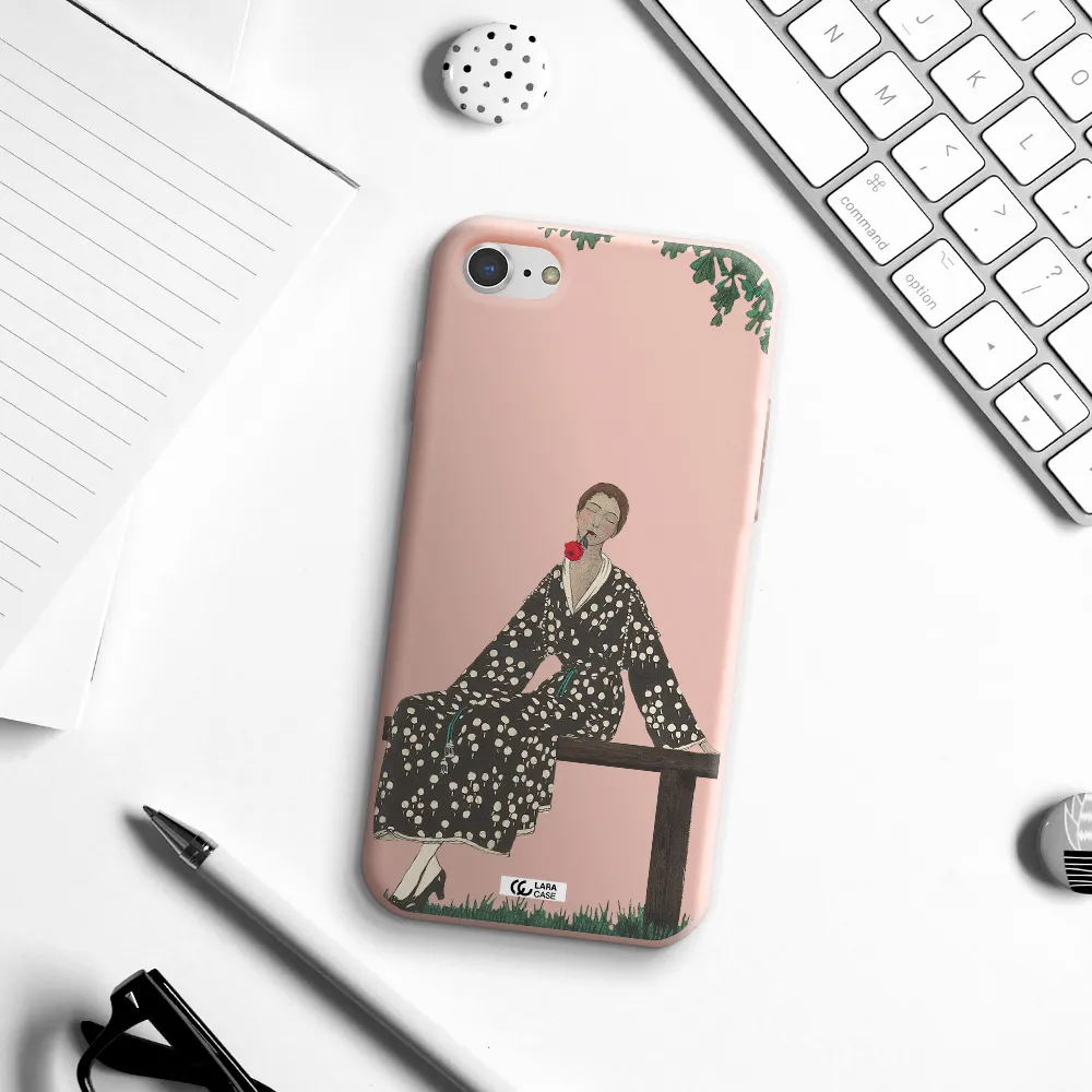 a woman sitting on a bench Apple iPhone 7 Silicone pastel pink Case