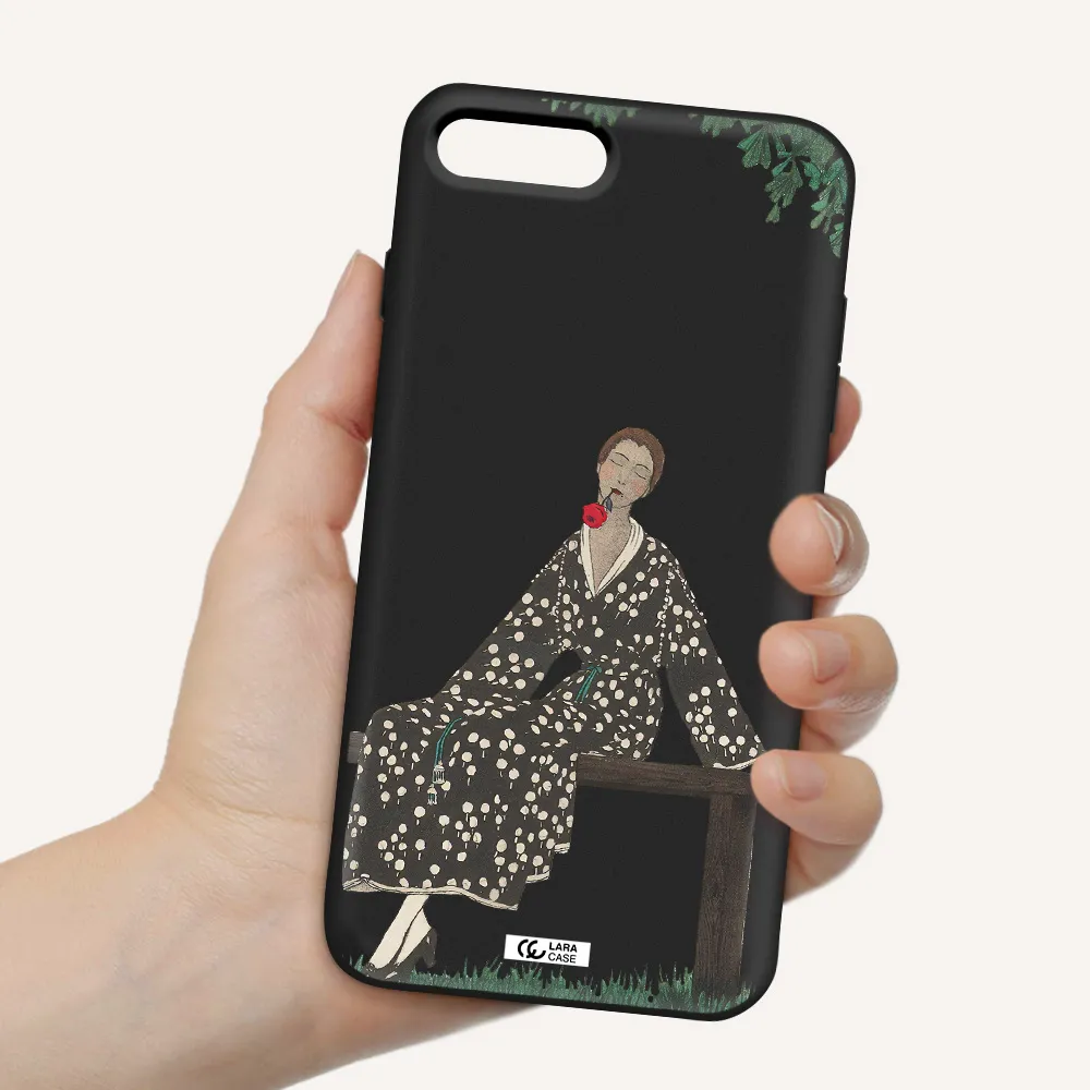 a woman sitting on a bench Apple iPhone 8 plus Silicone black Case