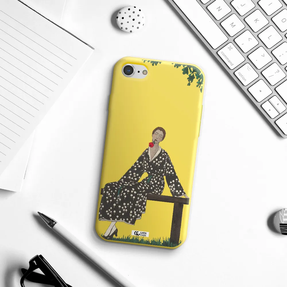 a woman sitting on a bench Apple iPhone 8 Silicone canary yellow Case