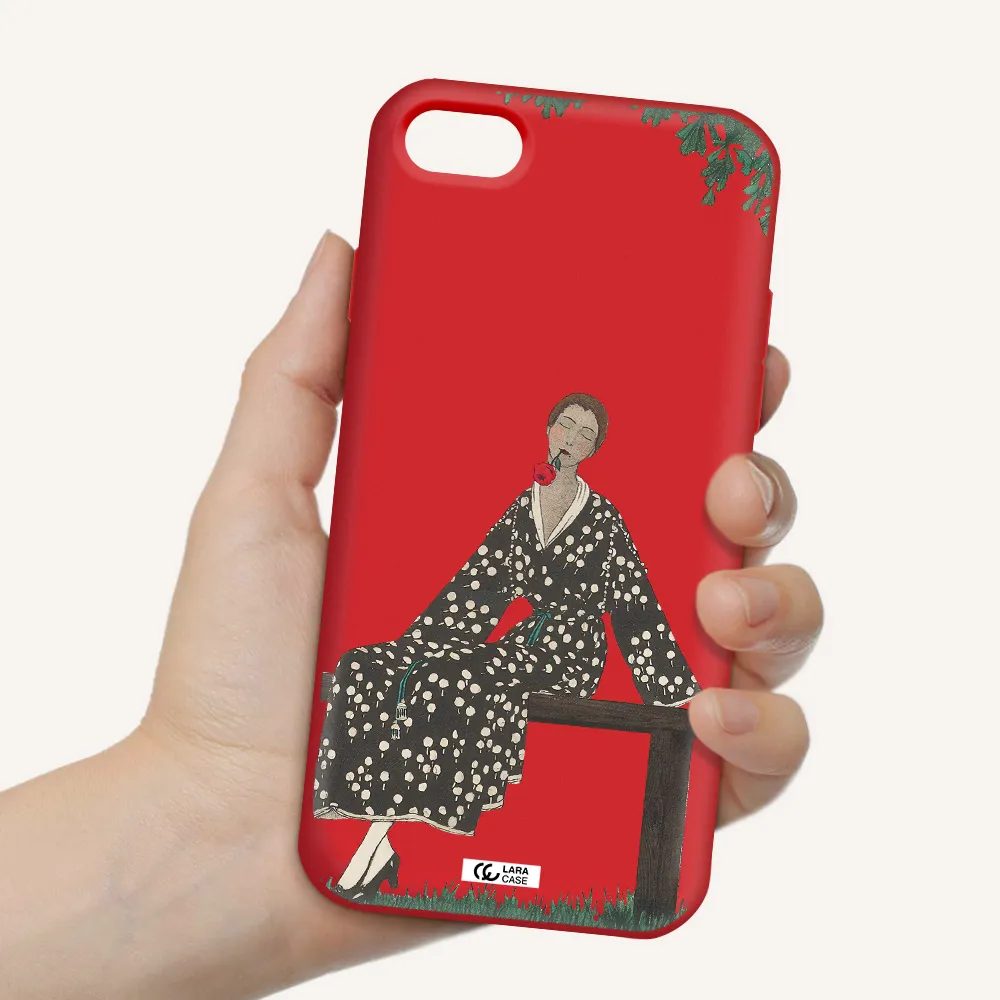 a woman sitting on a bench Apple iPhone 8 Silicone Imperial Red Case