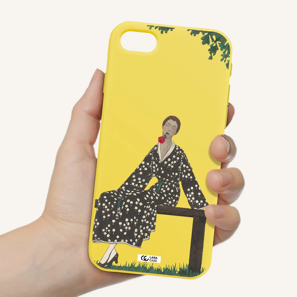 a woman sitting on a bench Apple iPhone se 2020 Silicone canary yellow Case