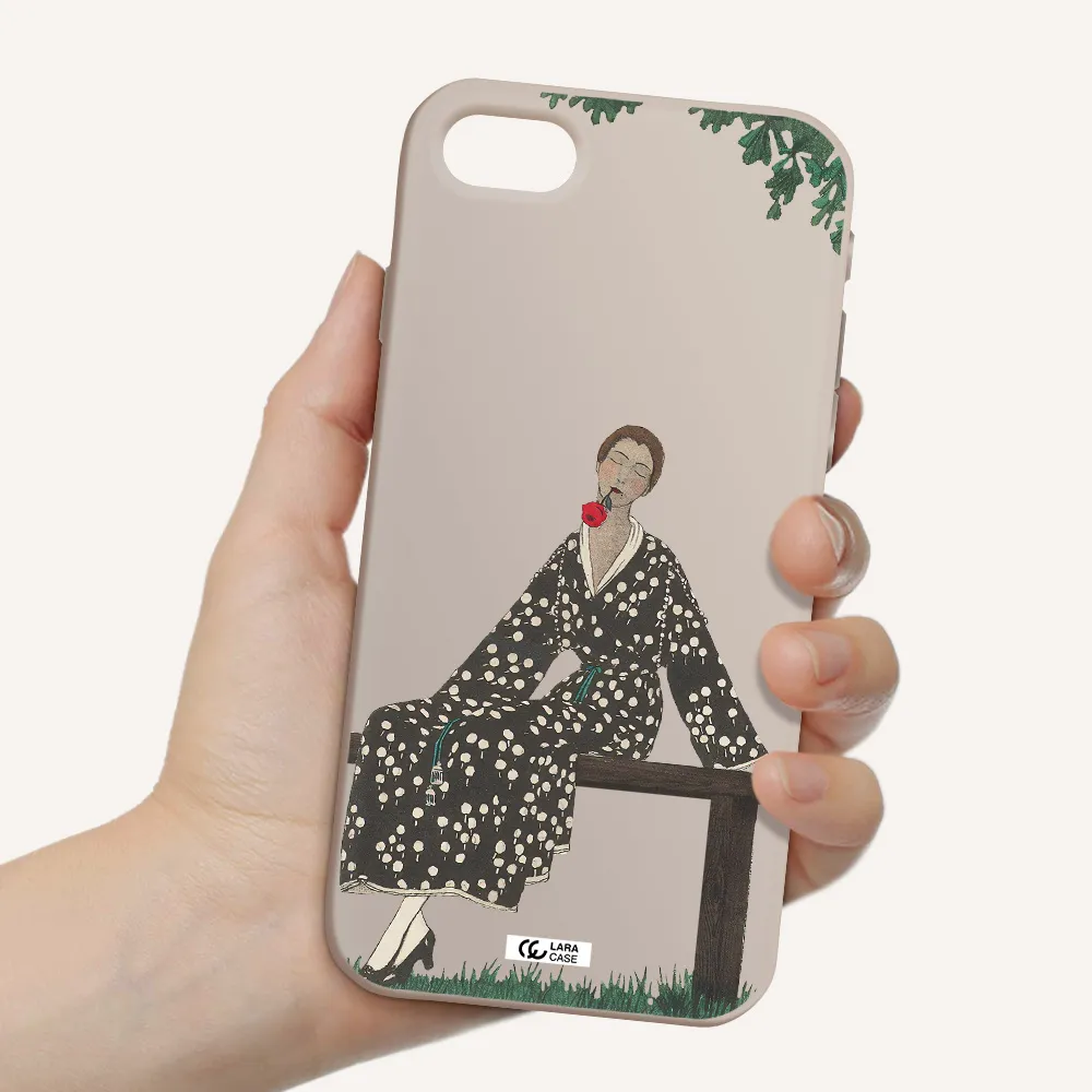 a woman sitting on a bench Apple iPhone se 2020 Silicone Stone Case