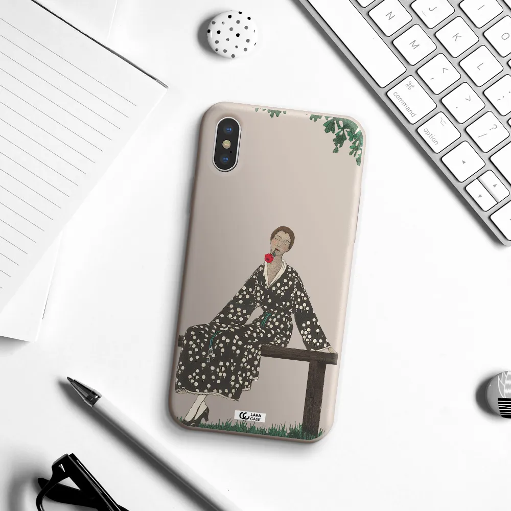 a woman sitting on a bench Apple iPhone X Silicone Stone Case
