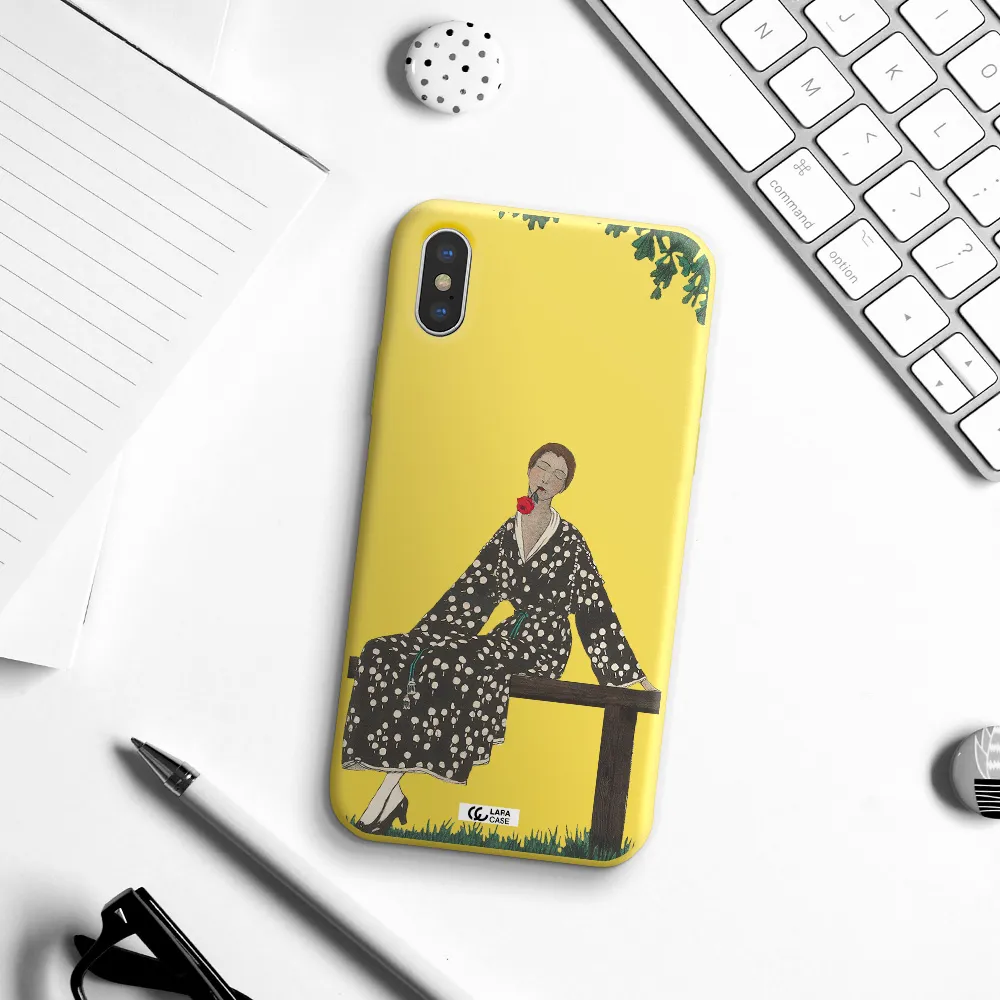 a woman sitting on a bench Apple iPhone XS Silicone canary yellow Case